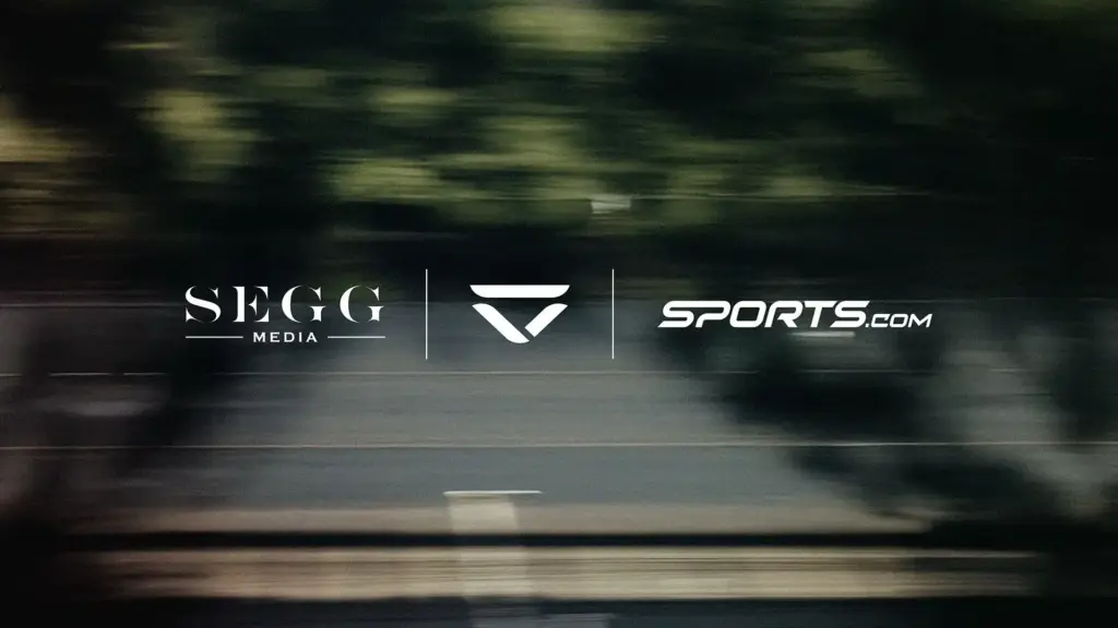 Image of Veloce, SEGG Media, and Sports.com logos on a blurred background