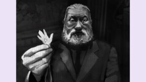 Man holding a mysterious talisman in Anchorhead