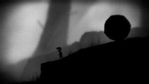 Limbo gameplay showing silhouetted boy with glowing eyes near a giant boulder in a dark forest