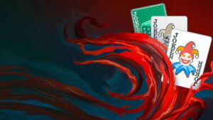 Joker playing cards surrounded by swirling red design in Balatro