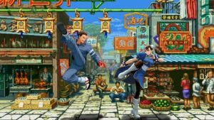 Two martial artists perform high kicks in a vibrant, bustling street market with colorful signs and stalls, exuding energy and action.