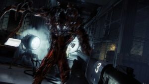Prey immersive sim gameplay with player using a shotgun against alien monster in a research lab
