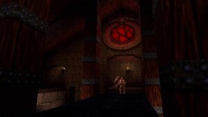 Screenshot from Quake with gothic castle walls, a red stained glass symbol, and monsters inside – one of the best boomer shooters to play in 2025.