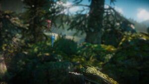 Two Yarny characters swing together through a lush forest in Unravel Two